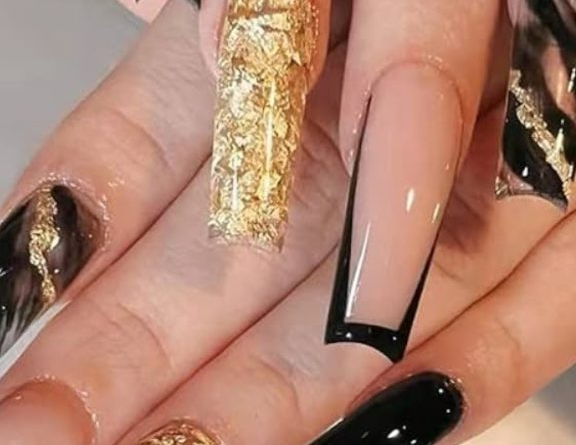 17. Black and Gold Coffin Nails